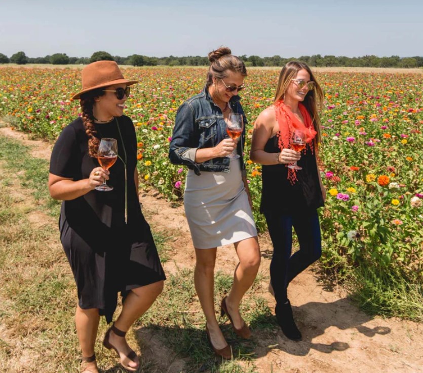 Women walking and tasting wine in the Texas Hill Country wine region